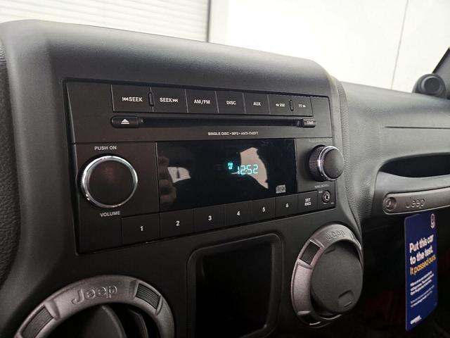 Photo of 2013 Burgundy Jeep Wrangler