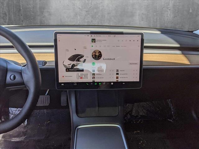 Photo of 2021 Pearl White Multi-Coat Tesla Model 3