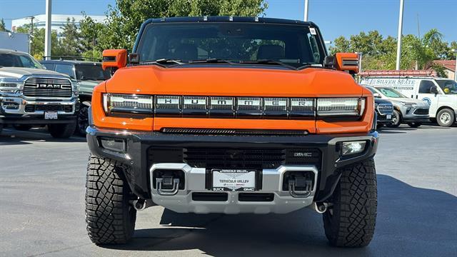 Photo of 2024 Afterburner Tintcoat (Orange) GMC HUMMER EV Pickup