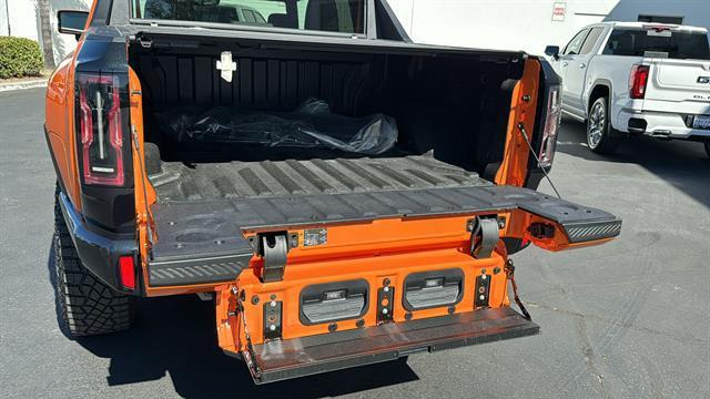 Photo of 2024 Afterburner Tintcoat (Orange) GMC HUMMER EV Pickup