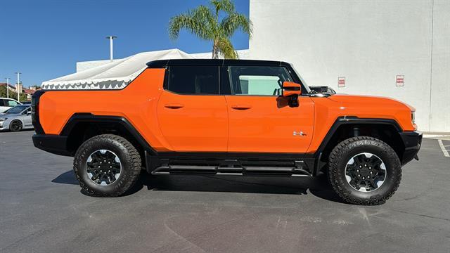 Photo of 2024 Afterburner Tintcoat (Orange) GMC HUMMER EV Pickup