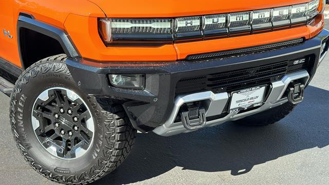 Photo of 2024 Afterburner Tintcoat (Orange) GMC HUMMER EV Pickup
