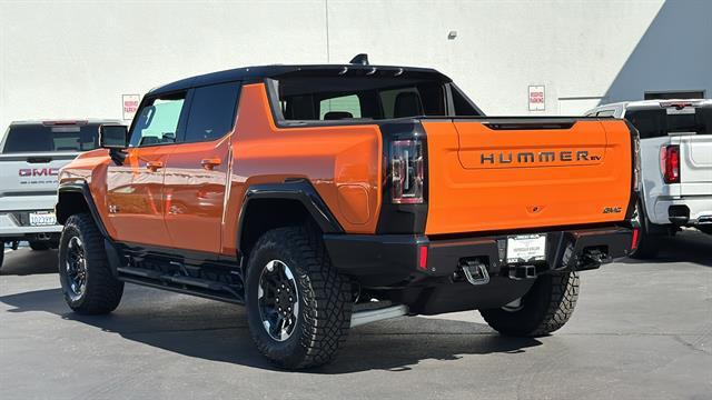Photo of 2024 Afterburner Tintcoat (Orange) GMC HUMMER EV Pickup
