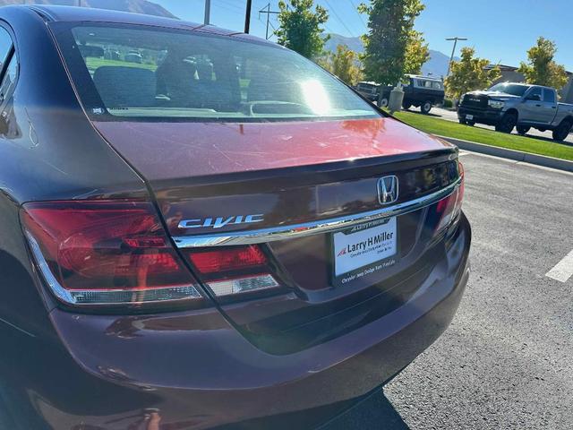 Photo of 2015 Crimson Pearl Honda Civic