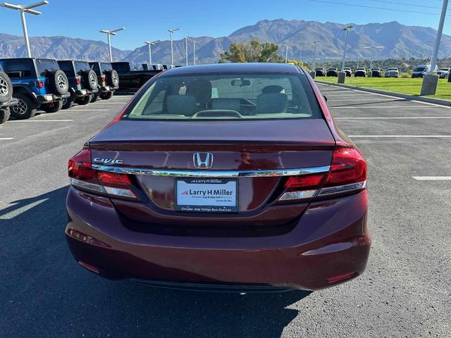 Photo of 2015 Crimson Pearl Honda Civic