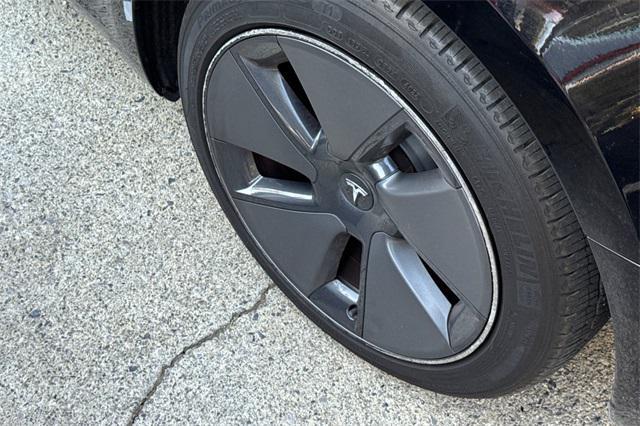 Photo of 2023 Solid Black Tesla Model 3