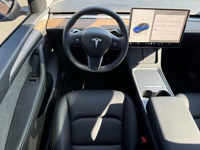 Photo of 2024 Deep Blue Metallic Tesla Model Y