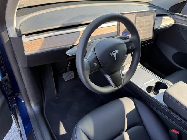 Photo of 2024 Deep Blue Metallic Tesla Model Y