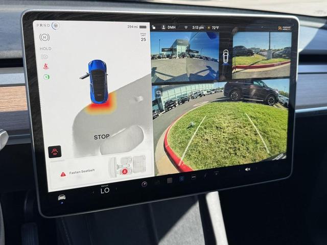 Photo of 2024 Deep Blue Metallic Tesla Model Y