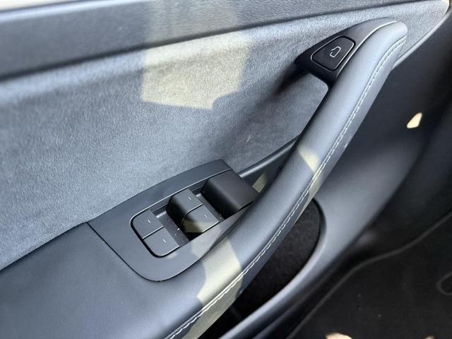 Photo of 2024 Deep Blue Metallic Tesla Model Y