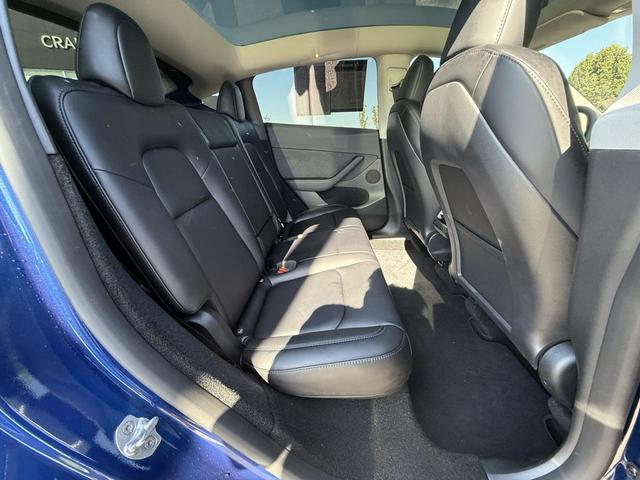 Photo of 2024 Deep Blue Metallic Tesla Model Y