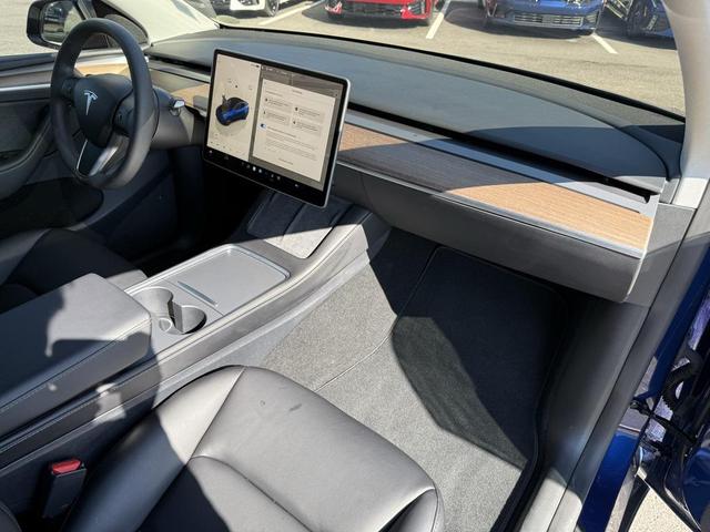 Photo of 2024 Deep Blue Metallic Tesla Model Y