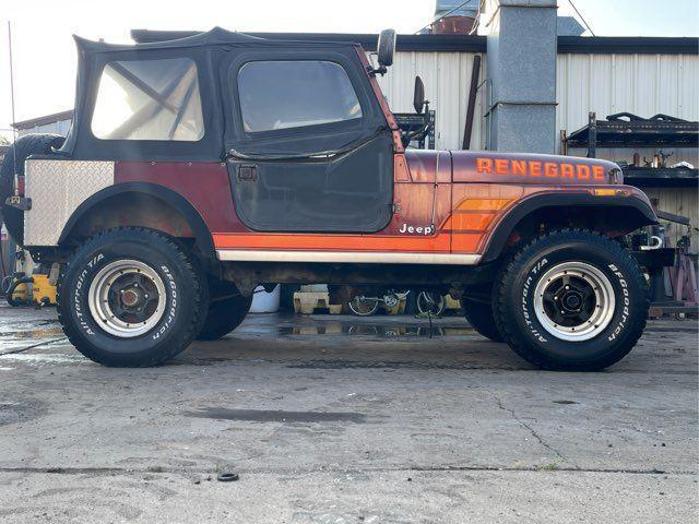 Photo of 1984 Burgundy Jeep CJ-7