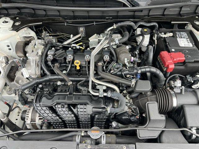 Photo of 2023 Pearl White Tricoat Nissan Altima