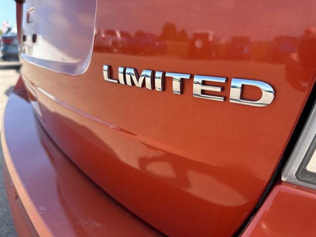 Photo of 2008 Burnt Oran Ford Edge