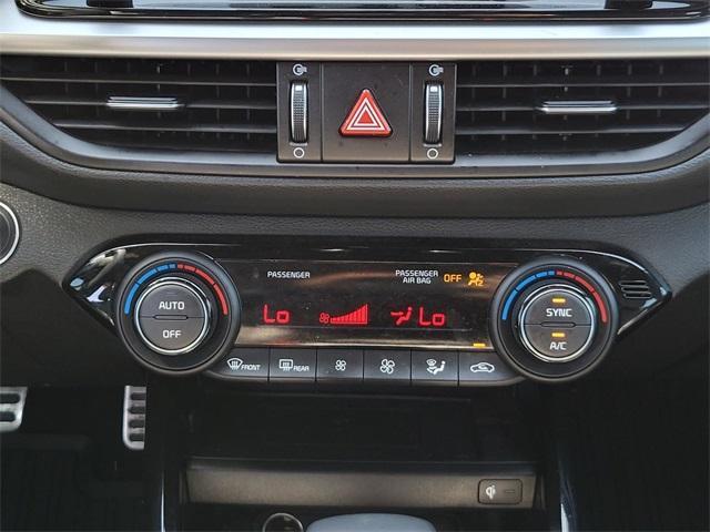 Photo of 2023 Currant Red Kia Forte