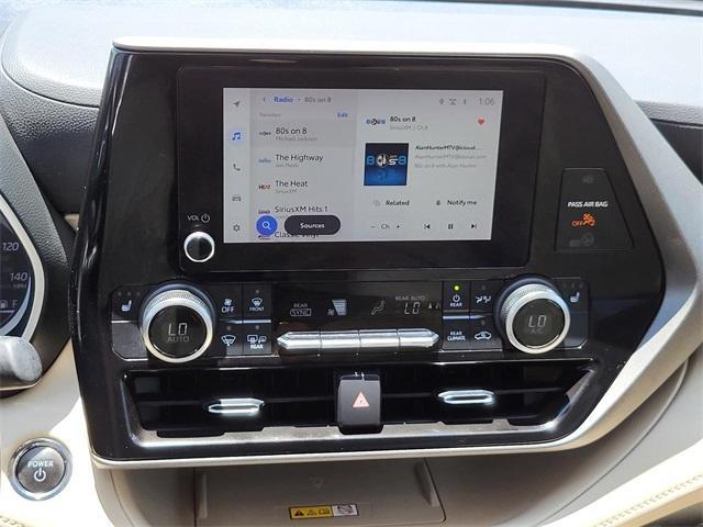 Photo of 2023 Ruby Flare Pearl Toyota Highlander Hybrid