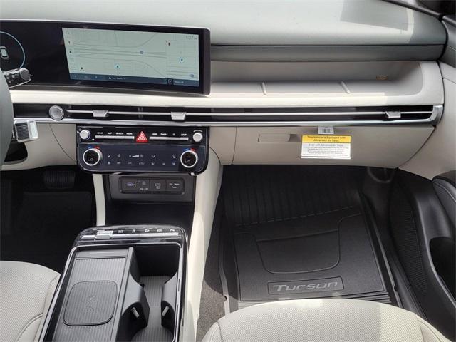 Photo of 2025 White Pearl Hyundai TUCSON