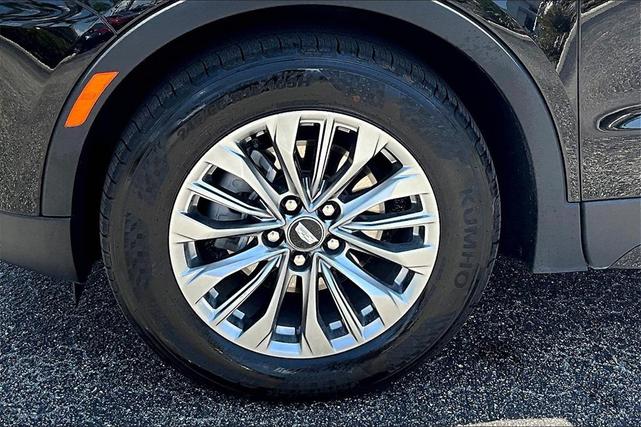 Photo of 2024 Stellar Black Metallic Cadillac XT4