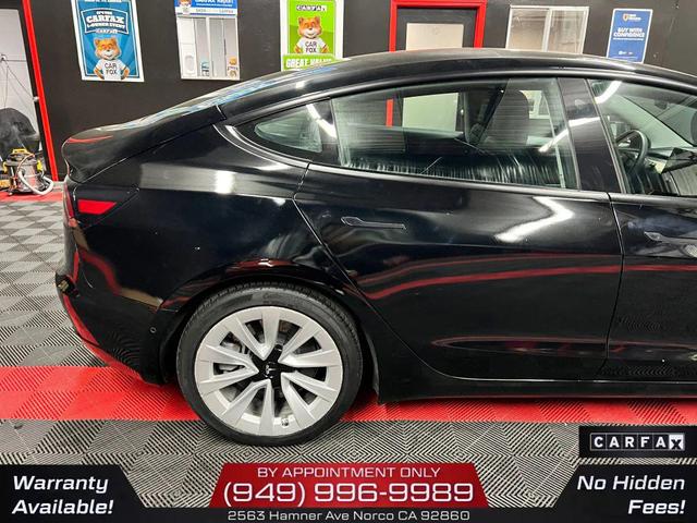 Photo of 2022 Solid Black Tesla Model 3