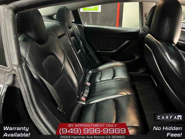 Photo of 2022 Solid Black Tesla Model 3