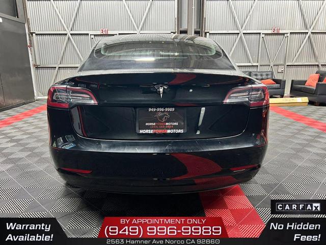 Photo of 2022 Solid Black Tesla Model 3