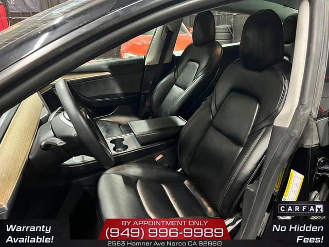 Photo of 2022 Solid Black Tesla Model 3