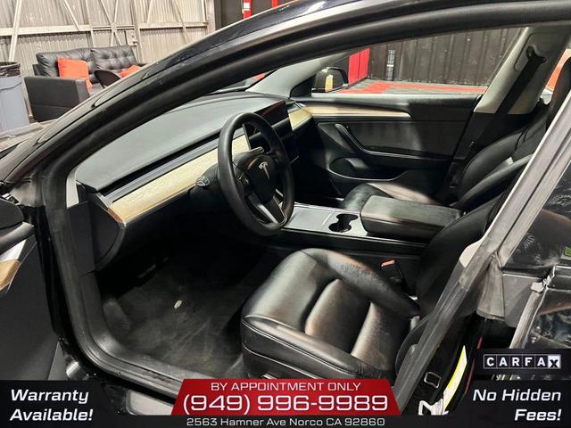 Photo of 2022 Solid Black Tesla Model 3