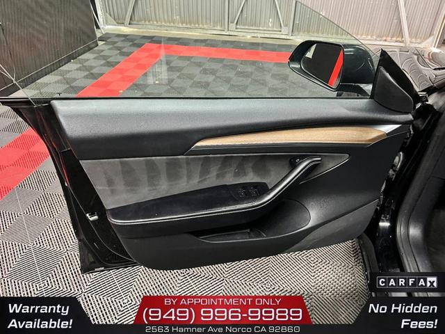 Photo of 2022 Solid Black Tesla Model 3