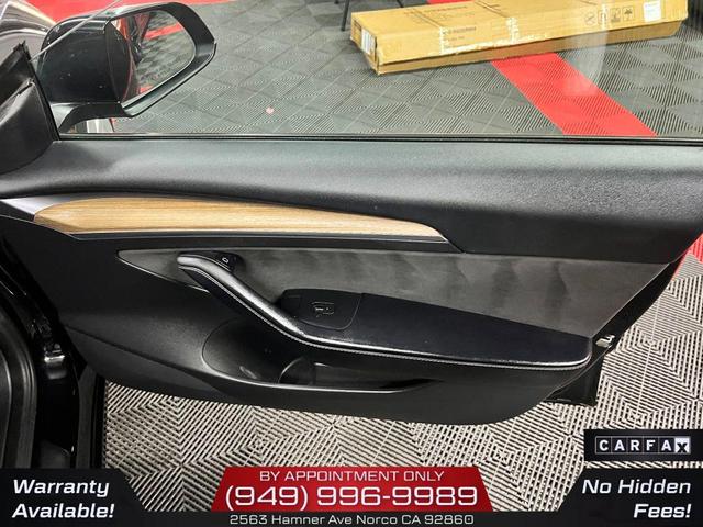Photo of 2022 Solid Black Tesla Model 3