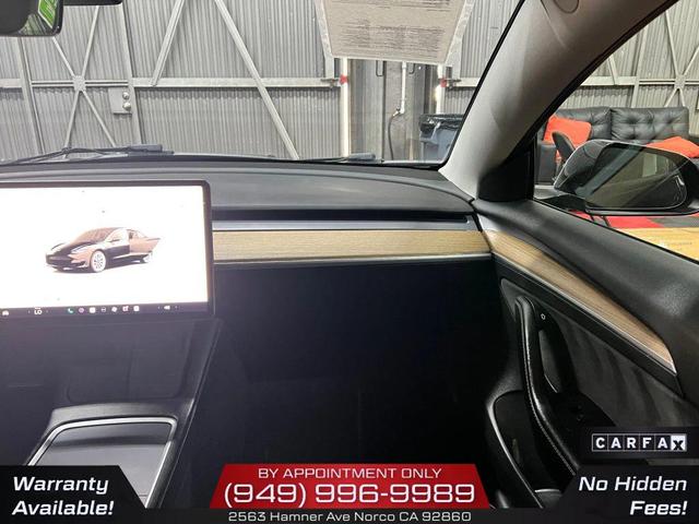 Photo of 2022 Solid Black Tesla Model 3