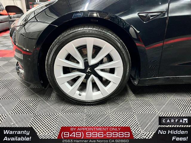 Photo of 2022 Solid Black Tesla Model 3