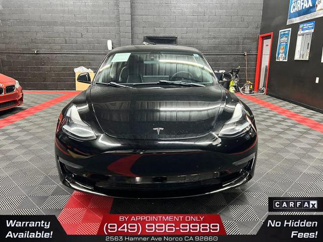 Photo of 2022 Solid Black Tesla Model 3