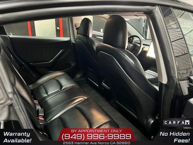 Photo of 2022 Solid Black Tesla Model 3
