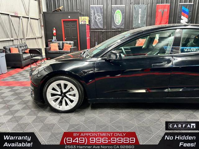 Photo of 2022 Solid Black Tesla Model 3