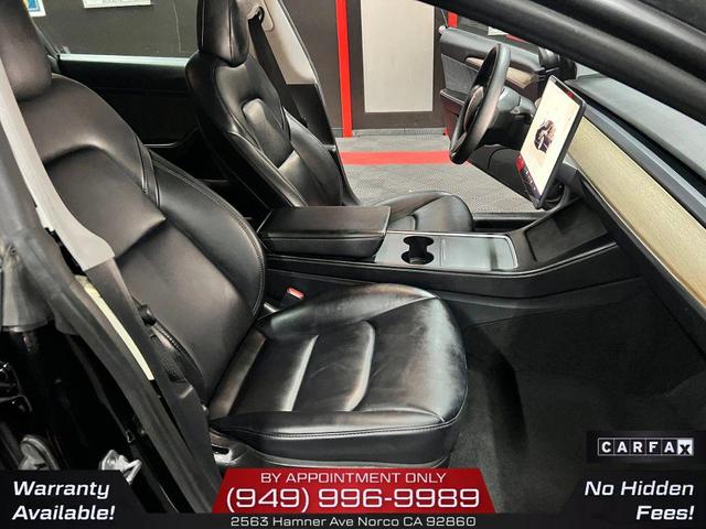 Photo of 2022 Solid Black Tesla Model 3