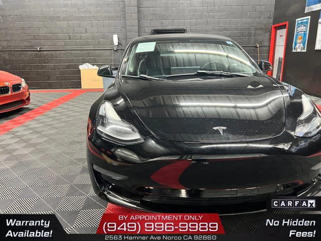 Photo of 2022 Solid Black Tesla Model 3