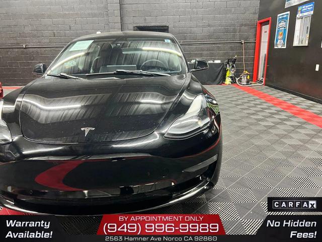 Photo of 2022 Solid Black Tesla Model 3