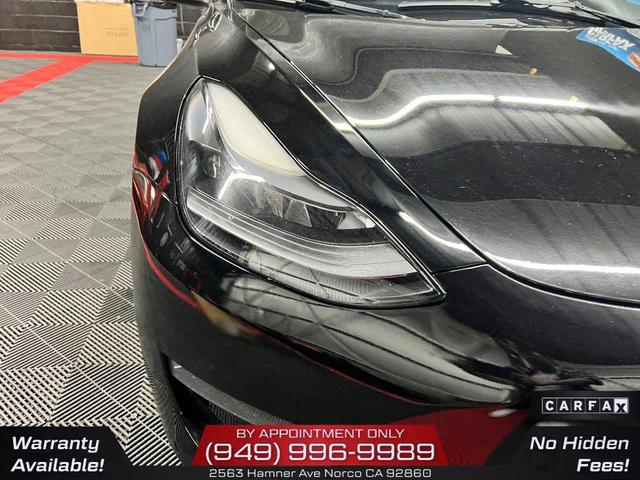 Photo of 2022 Solid Black Tesla Model 3