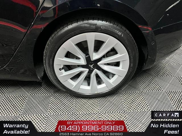 Photo of 2022 Solid Black Tesla Model 3