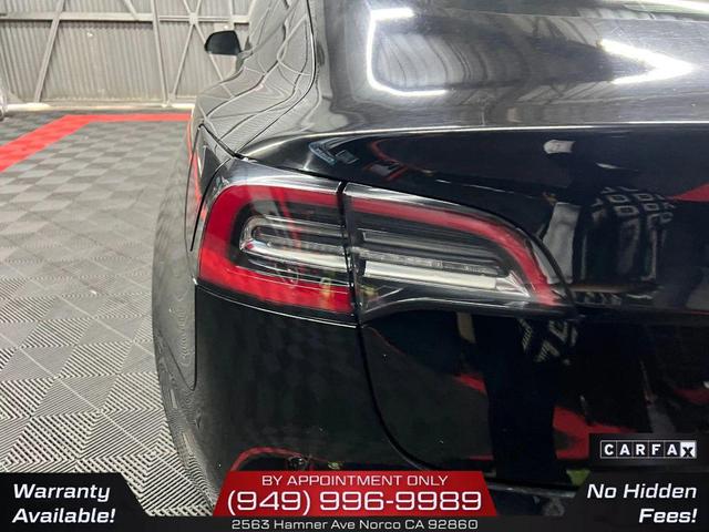 Photo of 2022 Solid Black Tesla Model 3