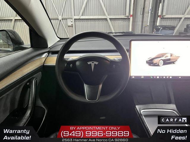 Photo of 2022 Solid Black Tesla Model 3