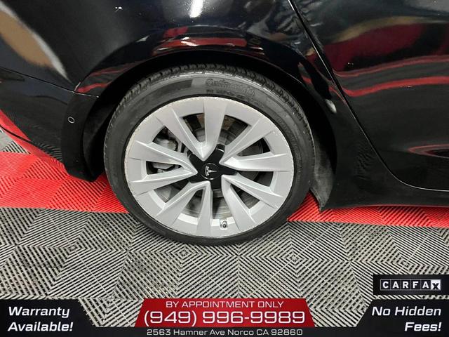 Photo of 2022 Solid Black Tesla Model 3