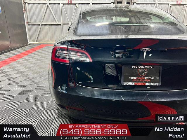 Photo of 2022 Solid Black Tesla Model 3