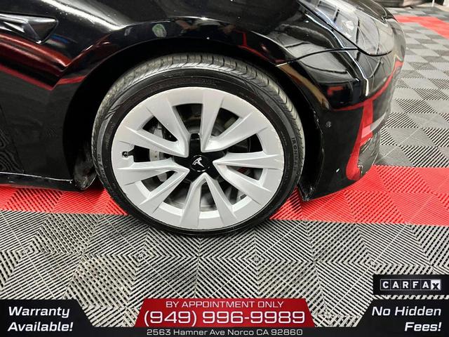 Photo of 2022 Solid Black Tesla Model 3