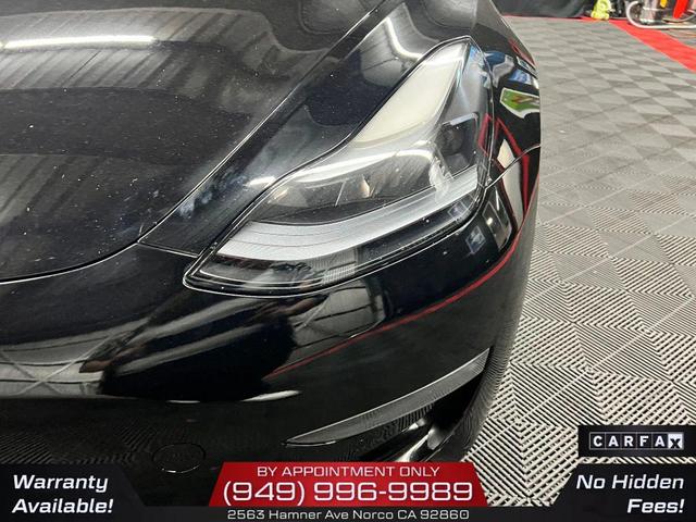 Photo of 2022 Solid Black Tesla Model 3