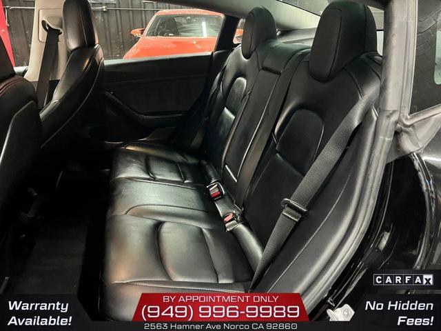 Photo of 2022 Solid Black Tesla Model 3