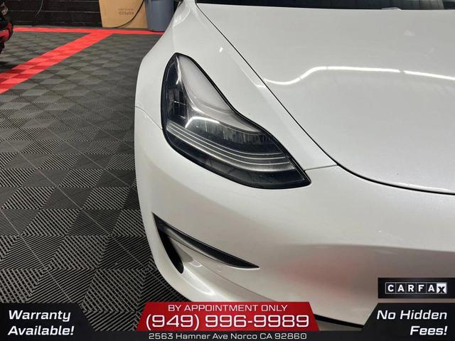 Photo of 2020 Pearl White Multi-Coat Tesla Model 3