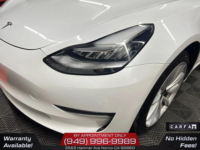 Photo of 2020 Pearl White Multi-Coat Tesla Model 3