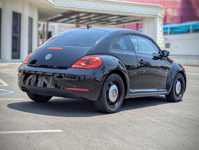 Photo of 2015 Black Uni Volkswagen Beetle